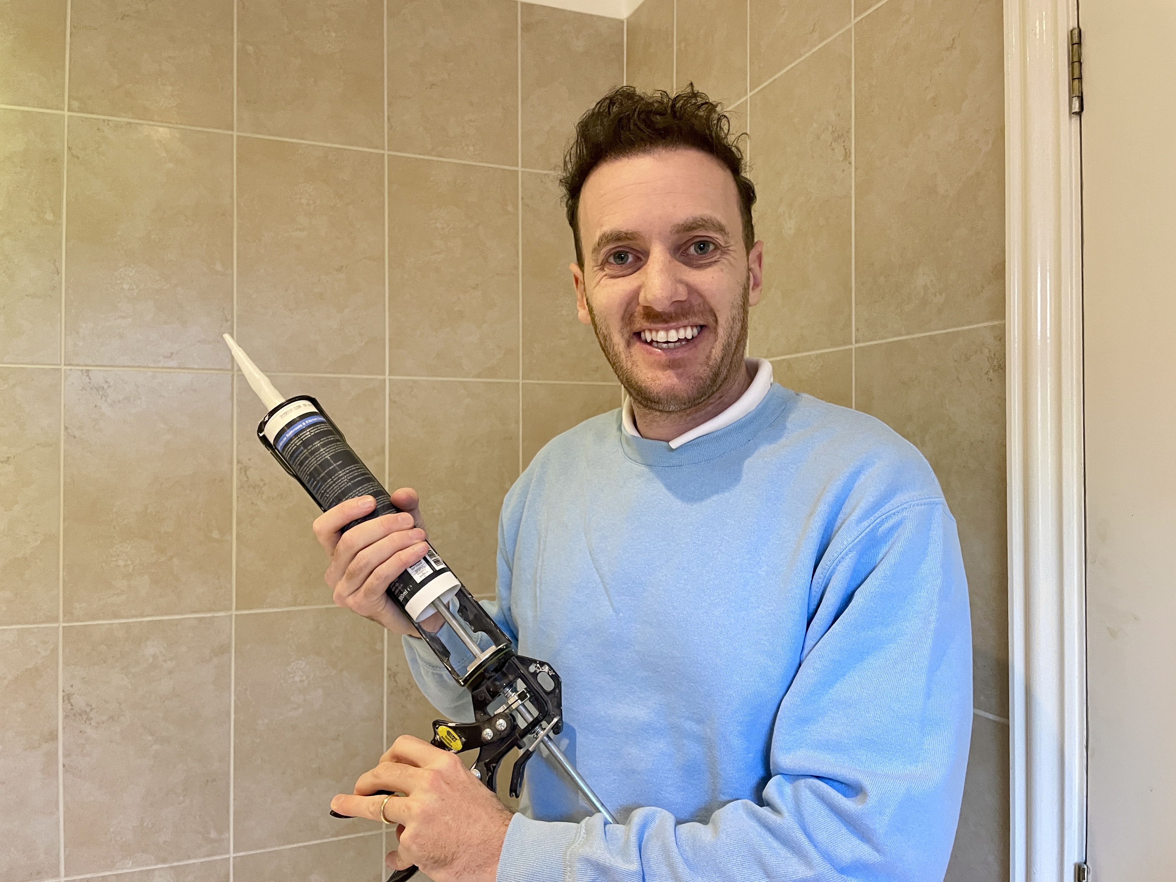 Mastic man applying silicone sealant in Burnham-On-Crouch kitchen